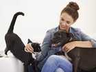 Lady with a cat and dog